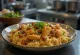 Kabsa servert med mandler og rosiner