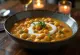 Chana Masala med kokosmelk, pyntet med frisk koriander