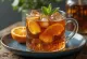Appelsin- og honning-iste i glass